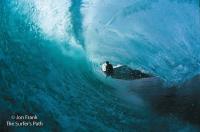 Anthony Walsh passing by Teahupoo Tahiti
